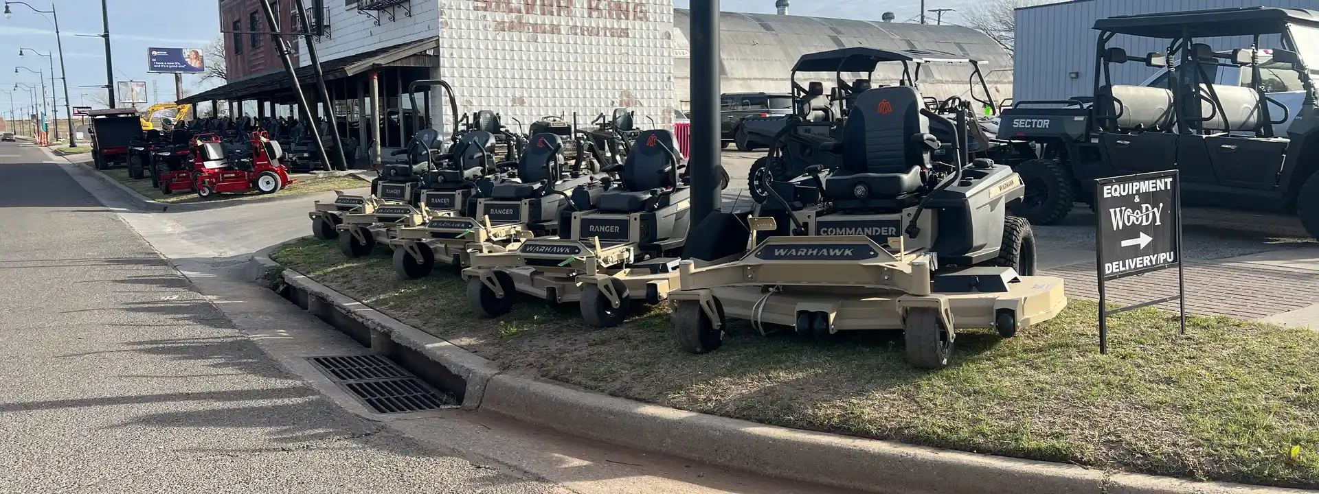 Ryno Equipment dealer lot with Warhawk mower lineup