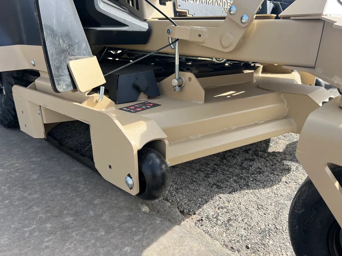 Heavy-gauge fabricated steel deck on a Warhawk Commander mower